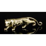 A modern Cartier 18ct gold Panther pattern brooch, heavily cast with emerald set eyes, No. 633536,