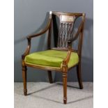 An Edwardian rosewood square back open arm easy chair, the moulded back inset with panel inlaid with