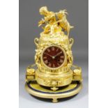 A mid 19th Century French ormolu cased mantel clock, the 3.25ins diameter dark marble dial with gilt