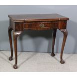 An early 20th Century figured mahogany rectangular card table of 18th Century design by Waring &