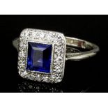 A modern 18ct white gold and platinum mounted sapphire and diamond ring, the square cut sapphire