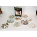 COLLECTION OF THIRTY TWO ROYAL DOULTON CHINA COLLECTORS PLATES, COMPRISING; 'Family Christmas' (x