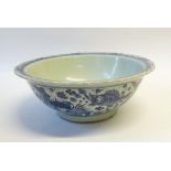 AN INTERESTING CHINESE PORCELAIN 'FISH' BOWL BEARING, BENEATH THE EVERTED BARBED RIM, A SIX