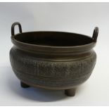 CHINESE ARCHAIC STYLE PATINATED BRONZE TWO-HANDLED BOWL OR CENSER, steep sided form with loop
