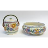 TWO PIECES OF POOLE POTTERY floral painted in colours beneath dashed rims, comprising swing