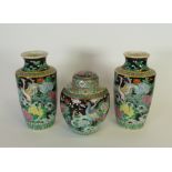 PAIR OF EARLY TWENTIETH CENTURY JAPANESE PORCELAIN FAMILLE NOIR DECORATED SHOULDERED OVIFORM