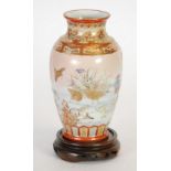 JAPANESE LATE MEIJI PERIOD HAND PAINTED KUTANI PORCELAIN VASE, of footed ovoid form with waisted