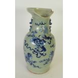 NINETEENTH CENTURY CHINESE CELADON GLAZED TWO HANDLED PORCELAIN VASE, of oviform with moulded shi-