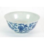 A SMALL CHINESE PORCELAIN BOWL bearing a six character Xuande (1426 - 35) reign mark within a double