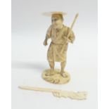JAPANESE MEIJI PERIOD CARVED SECTIONARY IVORY OKIMONO, modelled as a man wearing floral robes and