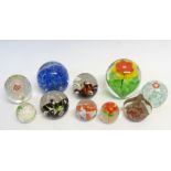 COLLECTION OF TEN MODERN GLASS PAPERWEIGHTS including two with floral inclusions, 4 1/2" (11.5cm)