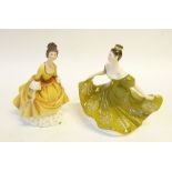 TWO ROYAL DOULTON CHINA FIGURES, 'Lynne' HN 2329, 7 1/2" (19cm) high and 'Coralie' HN 2307, 7 1/