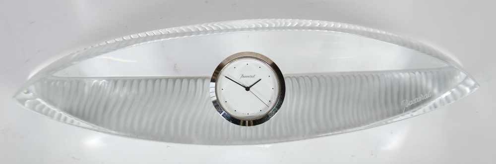 of pointed oval form with ripple effect base, housing a 1 1/2" dial, with spot batons, etched