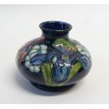 WALTER MOORCROFT 'ORCHID' PATTERN TUBE LINED POTTERY VASE of compressed form with short waister