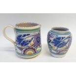 TWO MATCHING PIECES OF POOLE POTTERY, floral painted in colours beneath purple dashed rims,