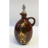 ROYAL DOULTON/DEWAR'S WHISKY CAPTAIN PHILLIP POTTERY FLASK of footed ovoid form with loop handle and