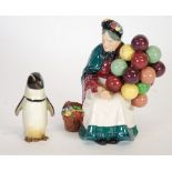 ROYAL DOULTON CHINA FIGURE, 'THE OLD BALLOON SELLER' HN 1315, 7 3/4" (19.7cm) high and a ROYAL