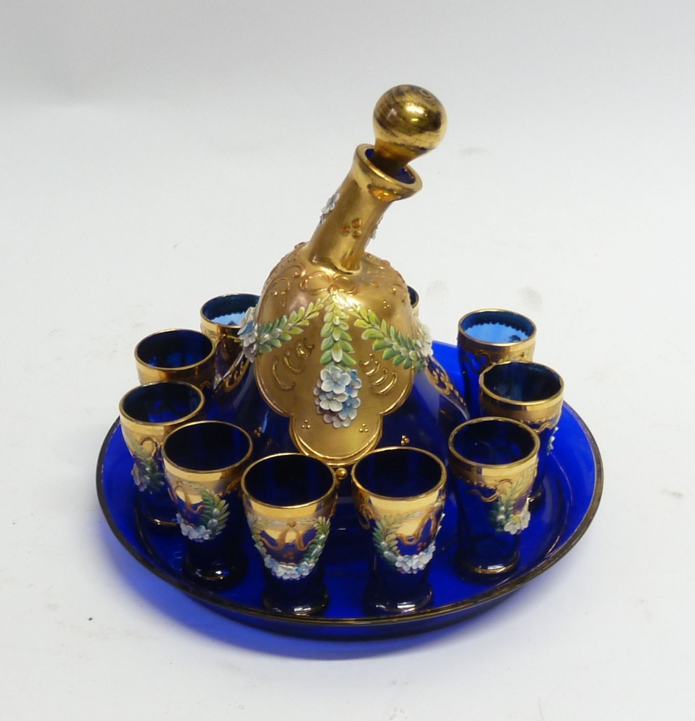 EARLY TWENTIETH CENTURY BOHEMIAN FLORAL ENCRUSTED BLUE GLASS AND GILT DRINKS SET FOR TEN PERSONS, - Image 2 of 2