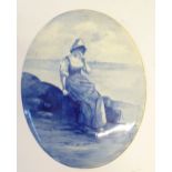 ROYAL DOULTON BLUE CHILD POTTERY WALL PLAQUE, oval form, decorated with a beach scene with seated