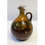 ROYAL DOULTON GOLDING KINGSWARE POTTERY FLASK of footed baluster form with loop handle and cork with