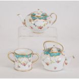 THREE MATCHING PIECES OF EARLY TWENTIETH CENTURY ROYAL CROWN DERBY MINIATURE CHINA, painted with