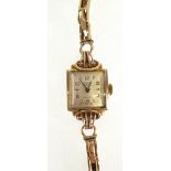 LADY'S ROLLED GOLD ROAMER WRIST WATCH, 17 jewel movement, silvered square Arabic dial, ON 9CT GOLD