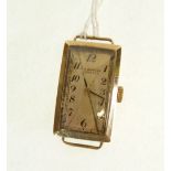 LADY'S 9CT GOLD CASED J.W. BENSON WRIST WATCH, 15 jewel movement, oblong silvered Arabic dial, lacks