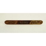 STAPMPED 9CT ROLLED GOLD 'BABY' BROOCH, 1.7g