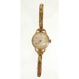 LADY'S VERTEX GOLD CASED WRIST WATCH, mechanical movement, with silvered Arabic dial, ON 9CT GOLD