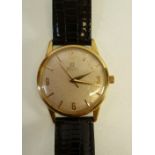 GENT'S OMEGA AUTOMATIC ROLLED GOLD WRISTWATCH with circular silvered dial with four Arabic