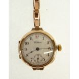 AN EARLY 20th CENTURY 9ct GOLD CASE WALTHAM LADY'S WRISTWATCH, on expandable bracelet