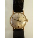 GENT'S LONGINES 9ct GOLD WRIST WATCH WITH MANUAL WIND MOVEMENT, circular silvered dial with batons