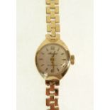 LADY'S 9CT CASED ACCURIST WRIST WATCH, 21 jewel movement, circular silvered dial with batons, ON