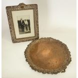 EARLY TWENTIETH CENTURY SILVER FRONTED EASEL PHOTOGRAPH FRAME, embossed with foliate scrolls and
