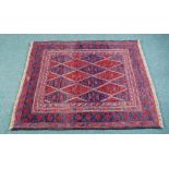 TRIBAL GAZAK HAND KNOTTED EASTERN RUG, with an embossed all-over diamond pattern in crimson and