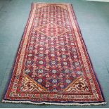 SHIRAZ PERSIAN RUNNER.  With diamond shaped crimson medallion on a midnight blue field with a