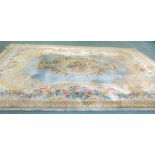 WASHED CHINESE BORDERED CARPET. Aubusson design,  the central floral medallion  on a grey/blue