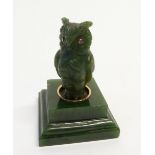AN IMPERIAL RUSSIAN CARVED SIBERIAN NEPHRITE JADE BELL PUSH IN SHAPE OF AN OWL set with cabochon