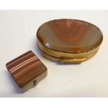 NINETEENTH CENTURY BANDED AGATE OVAL SNUFF BOX, with gilt metal mounts, 2 ½" (6.4cm) long AND A