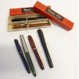 BOXED LARGE SIZE SWAN LEVER FOUNTAIN PEN with marbled red and black plastic case and swan "Eternal