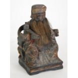 NINETEENTH CENTURY CHINESE CARVED WOOD AND GESSO WORK FIGURE OF A SEATED EMPEROR, in a throne on a