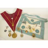 SELECTION OF MASONIC REGALIA, including two soft leather pinafores, sash and pendant, gloves