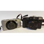 A CANON SURE-SHOT TELE, ROLL FILM CAMERA and a CANON SURE-SHOT 105 ZOOM ROLL FILM CAMERA (2)