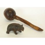 EARLY TWENTIETH CENTURY BLACK FOREST AND STAINED SOFTWOOD FIGURE OF A BROWN BEAR, depicted on all