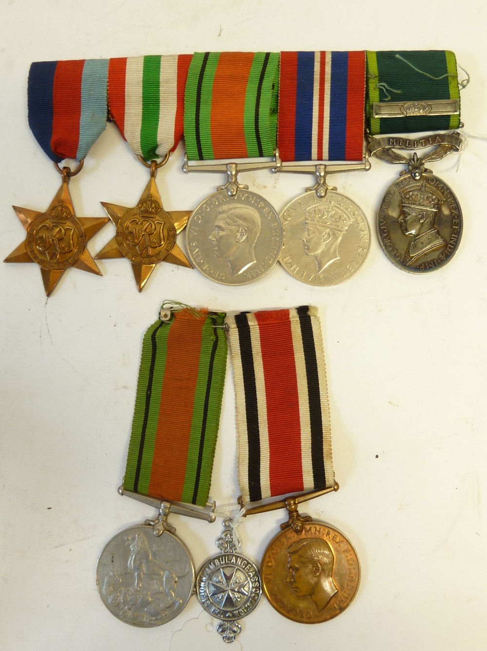 GROUP OF FIVE GEORGE VI WORLD WAR II SERVICE MEDALS AWARDED TO 3521603 S.P.R. T BAILEY R. E., viz