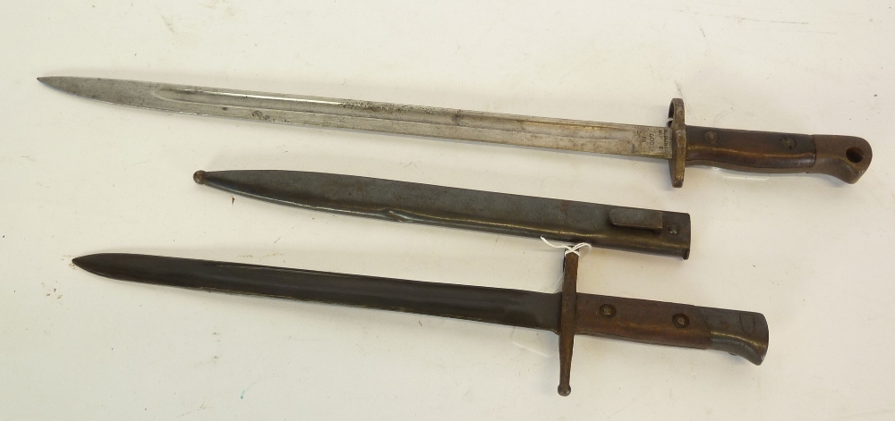 BRITISH 1907 PATTERN SWORD BAYONET by Wilkinson, having 17" (43.2cm) single edge blade and wood