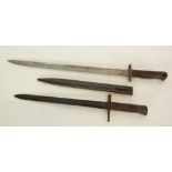 BRITISH 1907 PATTERN SWORD BAYONET by Wilkinson, having 17" (43.2cm) single edge blade and wood