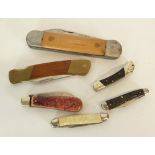 LARGE TWENTIETH CENTURY AMERICAN CLASP OF FOLDING KNIFE, the Bowie shaped blade stamped makers