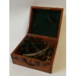 A WORLD WAR II MAHOGANY CASED BLACK JAPANNED LACQUERED BRASS SEXTANT