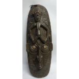 A ZAMBIAN CARVED WOOD LARGE WALL MASK,with female figure, 34" (86.4cm)